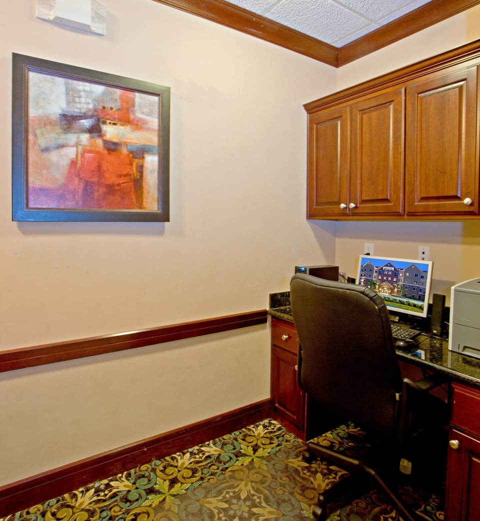 Business center with computer workstation.