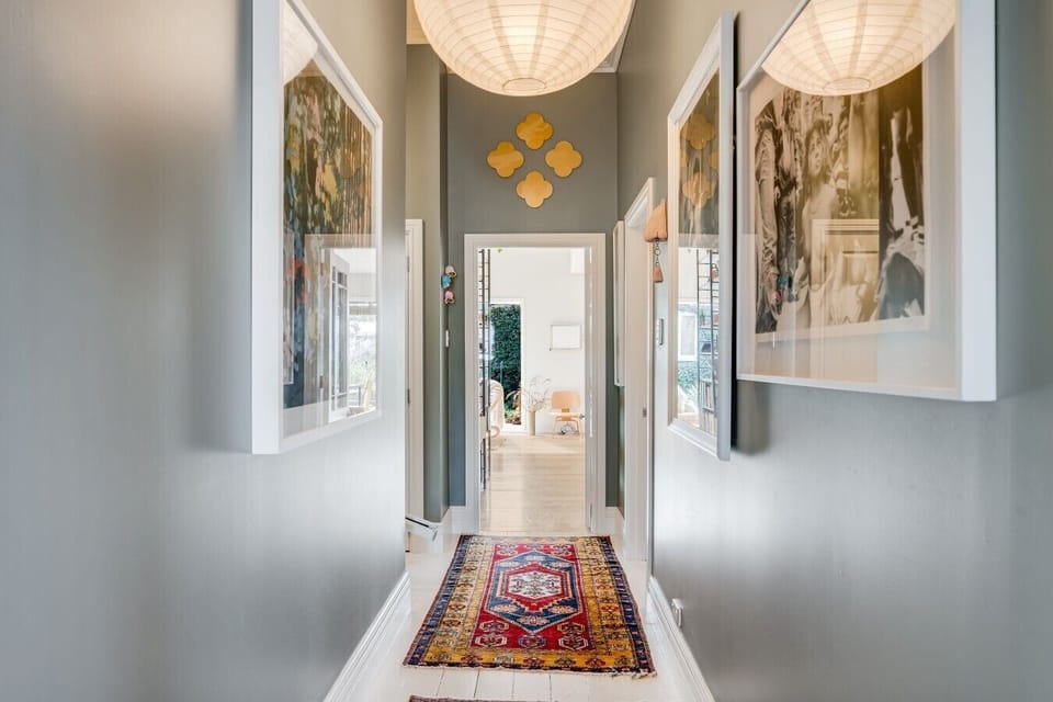 Art-lined hallway with character at every turn