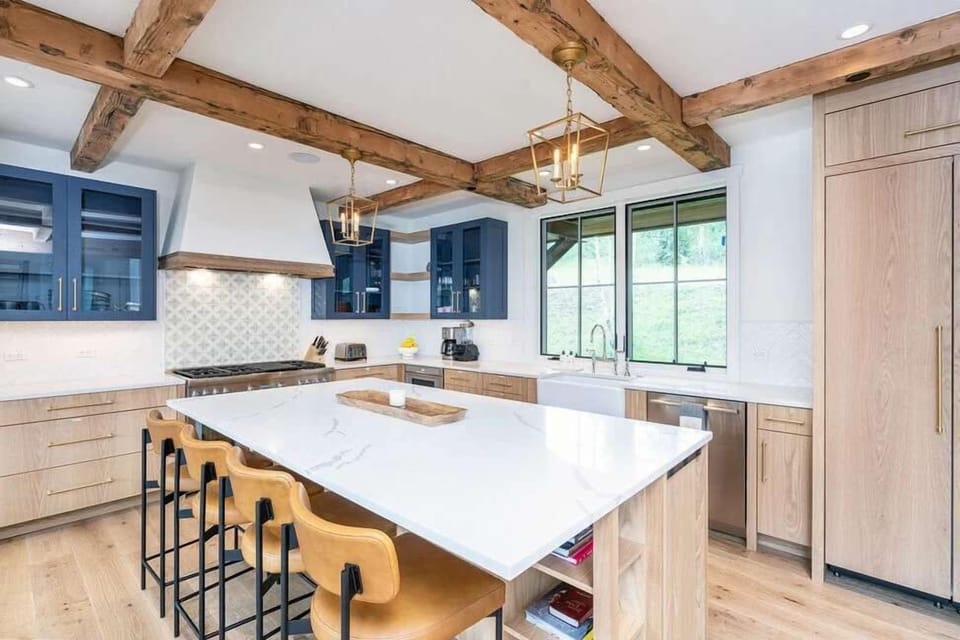 Fully stocked kitchen with high end appliances, large island for additional seating. 