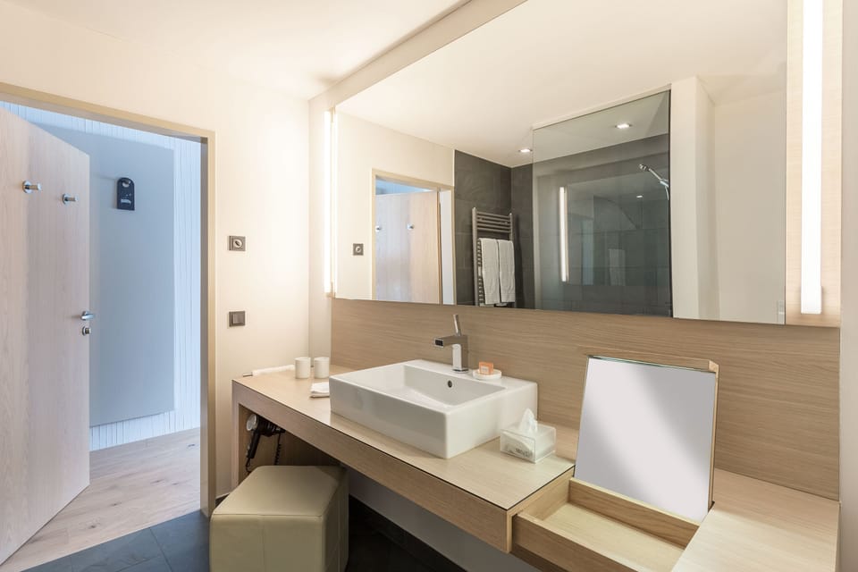 Superior Double Room | Bathroom | Designer toiletries, hair dryer, bathrobes, slippers