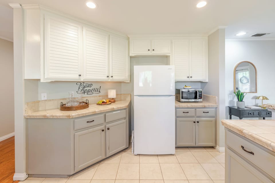 Bright, spacious kitchen with ample storage and generous counter space