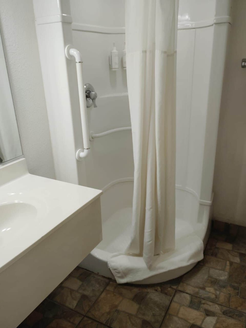 Shower, towels, soap, shampoo