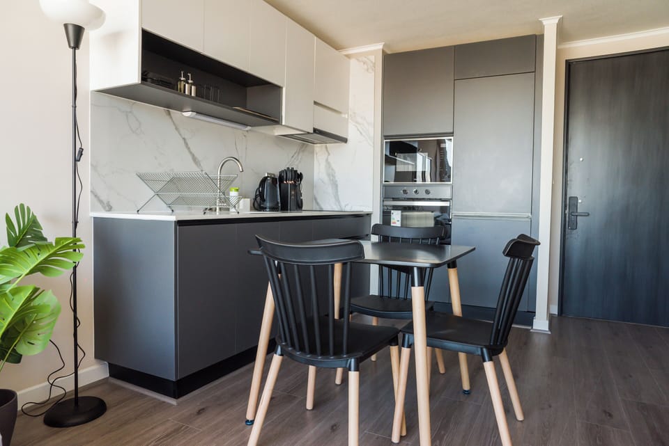 Standard Apartment, Balcony, City View | Dining
