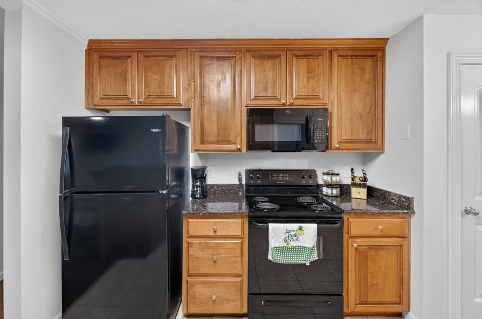 Well-equipped kitchen with ample space for cooking and gathering.