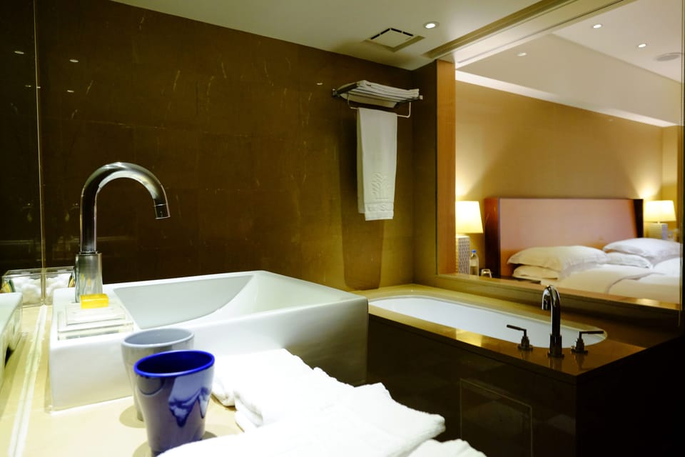 Deep soaking tub, rainfall showerhead, hair dryer, towels