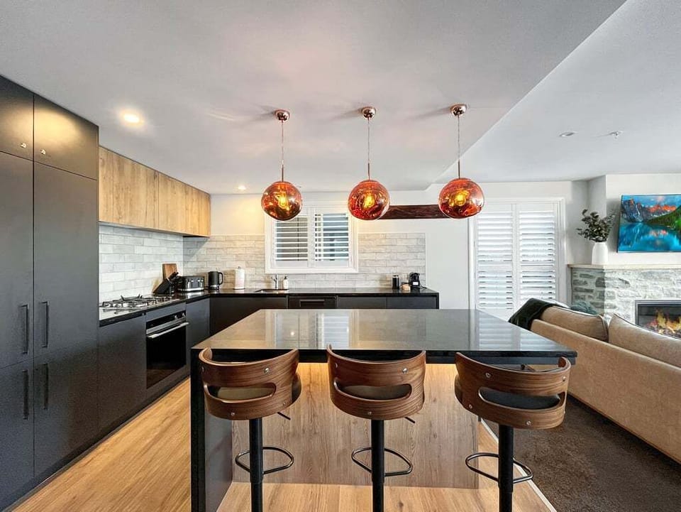 Modern kitchen with island bench and pendant lighting