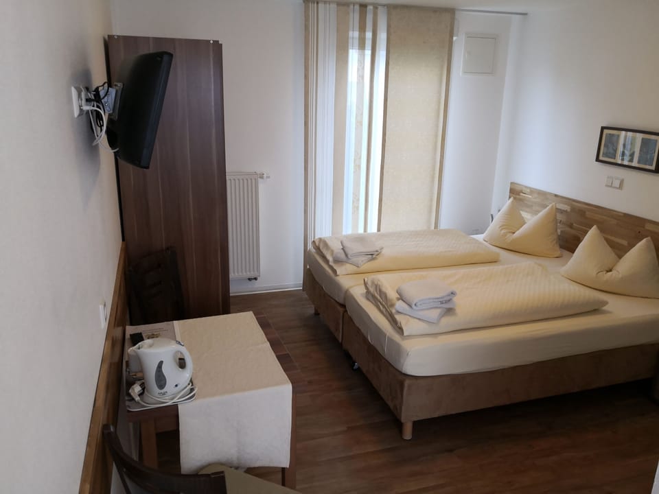 Desk, blackout drapes, iron/ironing board, free WiFi