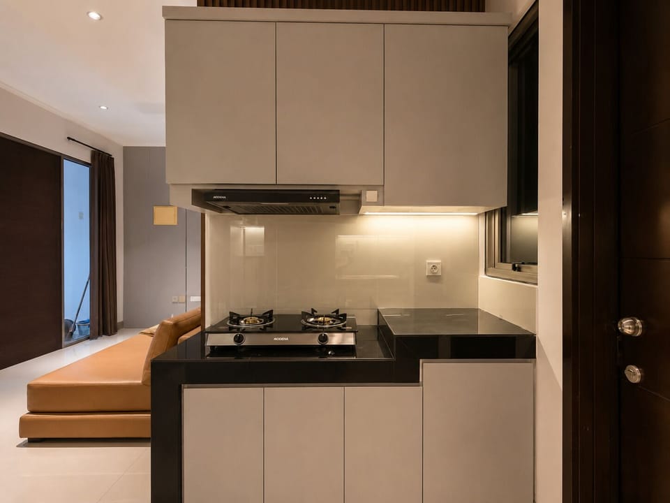 Apartment, Non Smoking, City View | Private kitchen | Fridge, microwave, stovetop, cookware/dishes/utensils