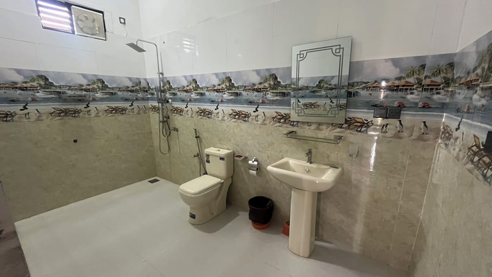 Shower, free toiletries, towels, toilet paper