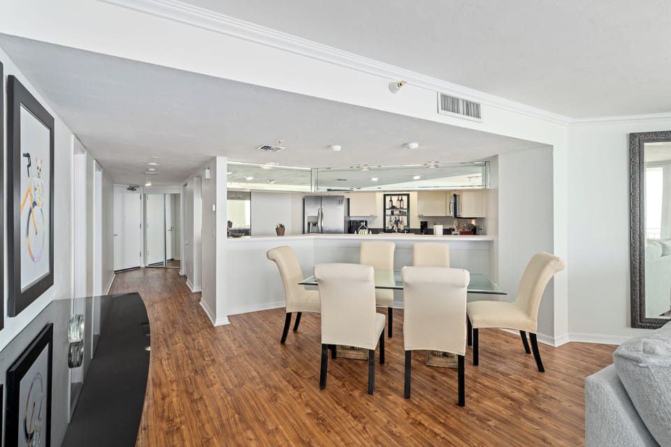 Dining table next to kitchen