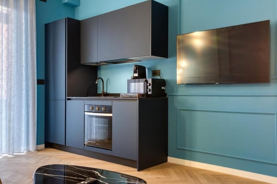 Deluxe Apartment, Balcony, City View | Private kitchen | Espresso maker, coffee/tea maker, fridge, oven