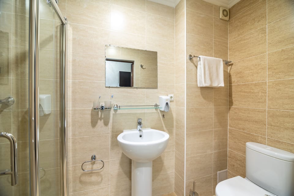 Double or Twin Room, City View | Bathroom | Shower, free toiletries, hair dryer, bathrobes