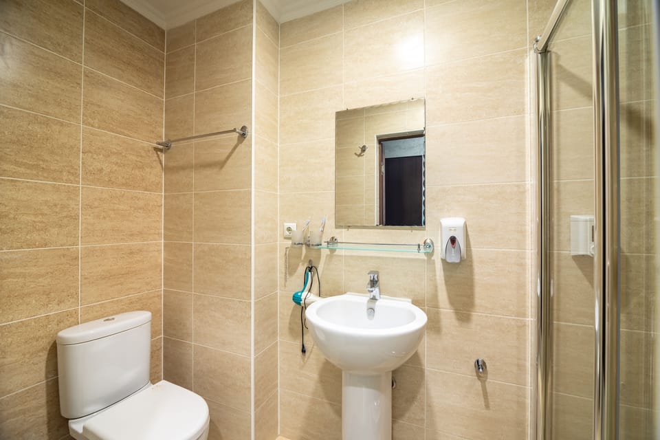 Double or Twin Room, City View | Bathroom | Shower, free toiletries, hair dryer, bathrobes