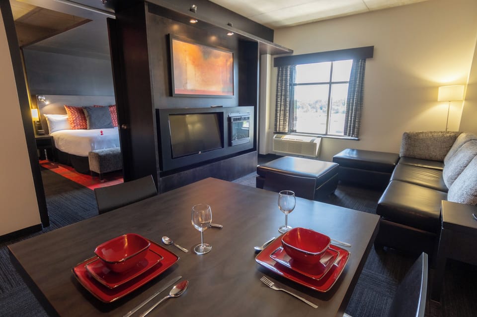 Presidential Suite, 1 King Bed | Living area | 55-inch flat-screen TV with cable channels, TV
