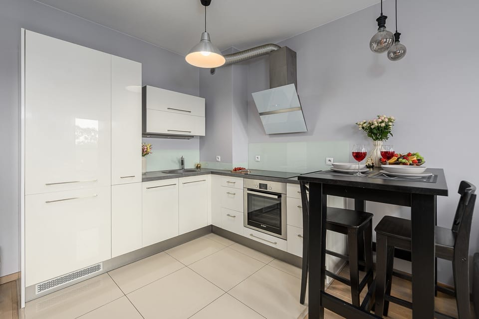 Classic Apartment, Balcony | Private kitchen | Electric kettle, highchair, griddle, eco-friendly cleaning products