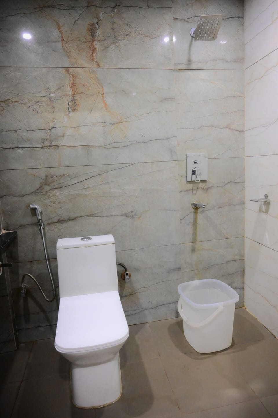 Deluxe Quadruple Room, City View | Bathroom | Shower, towels, soap, shampoo