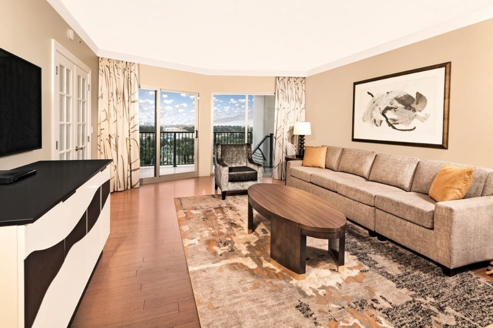 Living Area • Sofa, Armchair & Balcony Doors