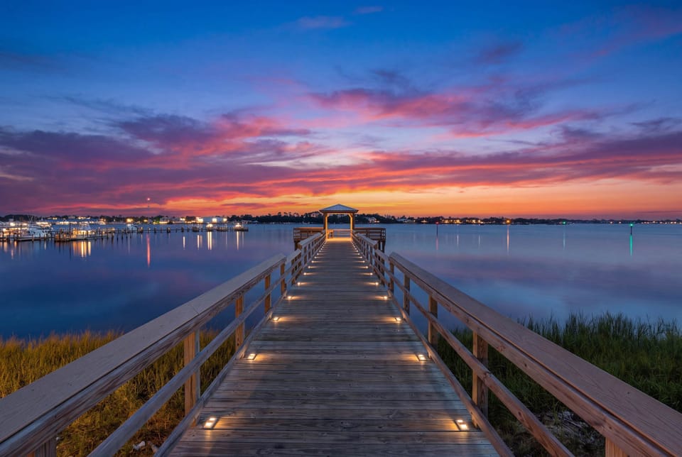 Front-row seats to nature's best show — sunset walks on your private dock, every evening.