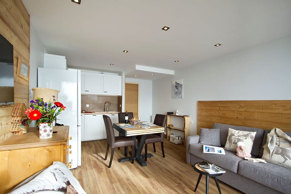 Inviting dining nook decorated with fresh mountain flowers