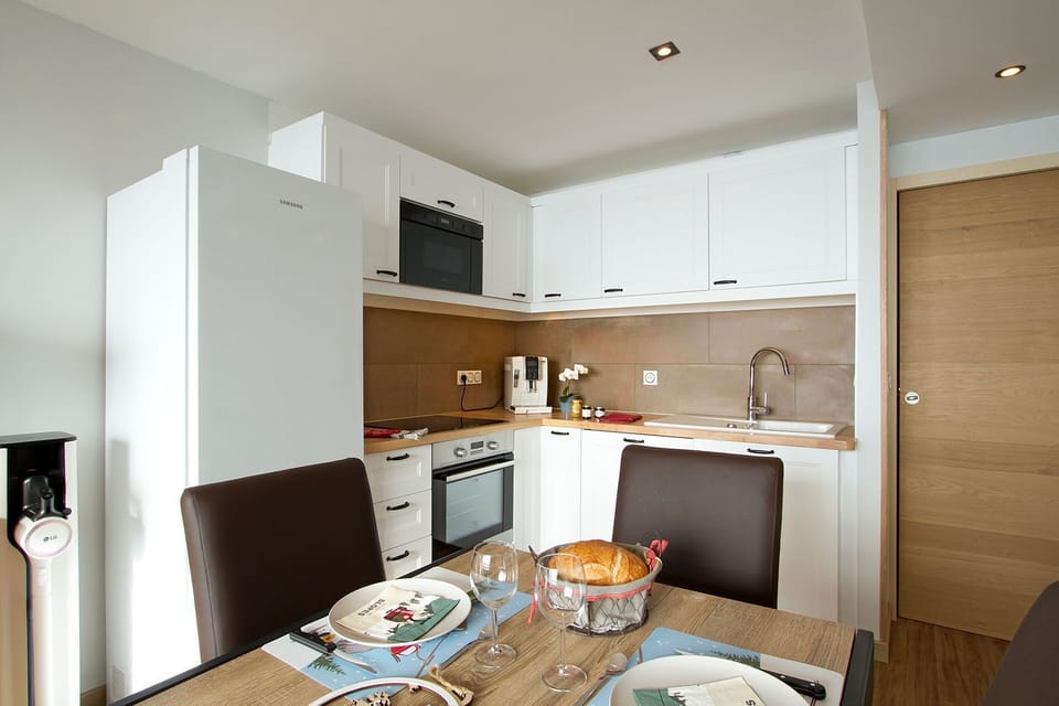 Sleek modern kitchen ready for self-catered mountain meals