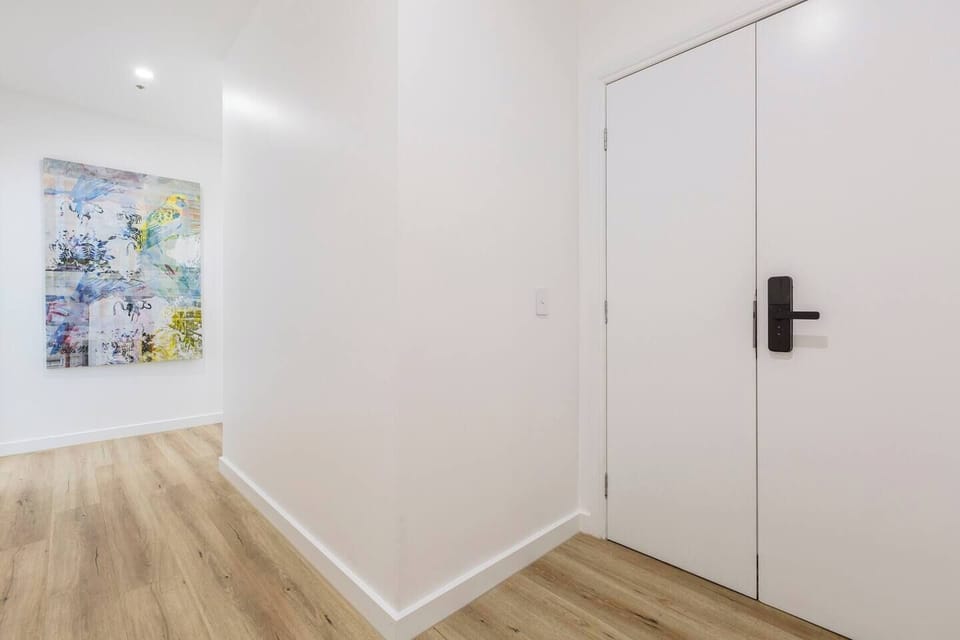 Arrive via a shared entryway before stepping through your own private front door into the studio.
