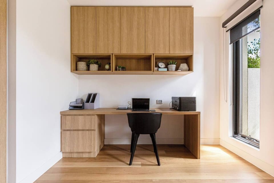 The dedicated office provides a quiet workspace with split-system heating and cooling — ideal for remote work or study.