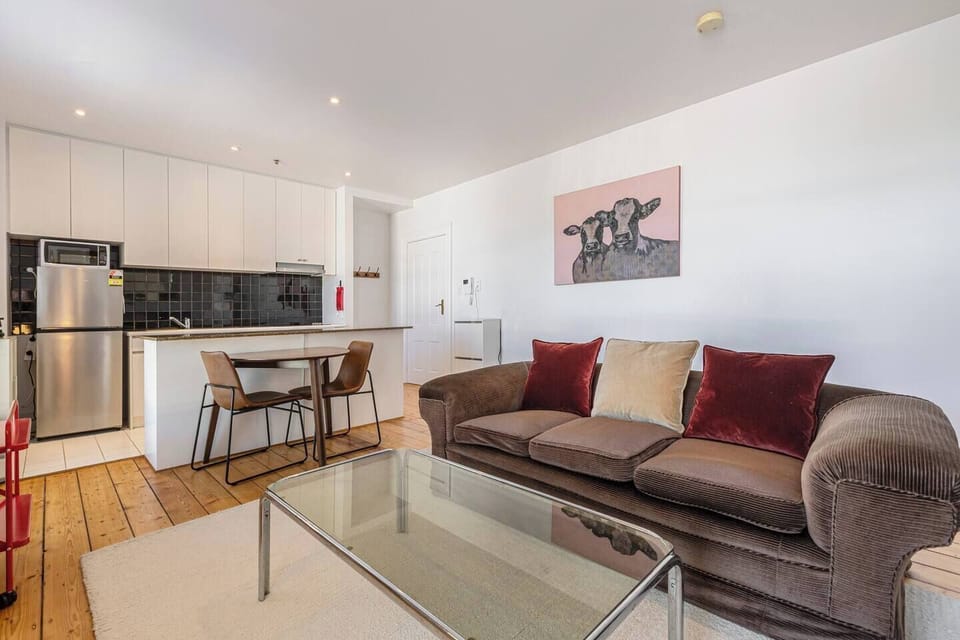 The open-plan layout brings the lounge, dining, and kitchen together, making it easy to cook, unwind, and enjoy every moment of your stay.