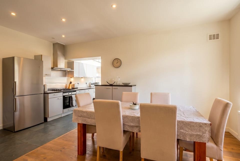 Open-plan kitchen and dining, made for cooking and connecting together.