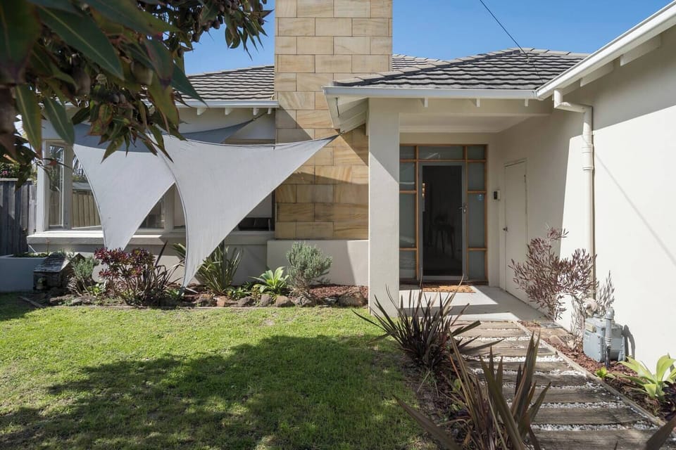Cleverly zoned across two levels, the home offers privacy, flow, and multiple spaces to relax or gather.