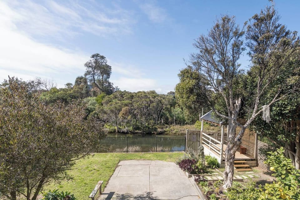 The private backyard offers peaceful views of Kananook Creek, with plenty of space to relax, play, or simply soak up the natural surroundings.
