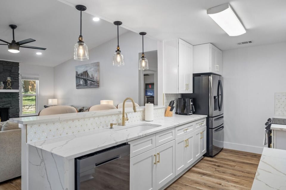 Grab a cold drink from the beverage fridge and brew fresh coffee in this fully stocked kitchen.
