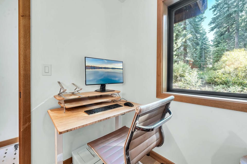 Dedicated workspace: Desk, chair, monitor, twin daybed (main floor)