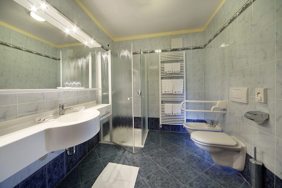 Shower, free toiletries, hair dryer, bathrobes