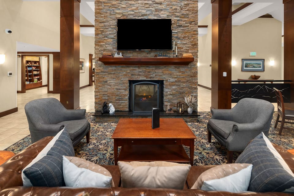 Curl up near the stone fireplace surrounded by lounge seating for a quiet moment