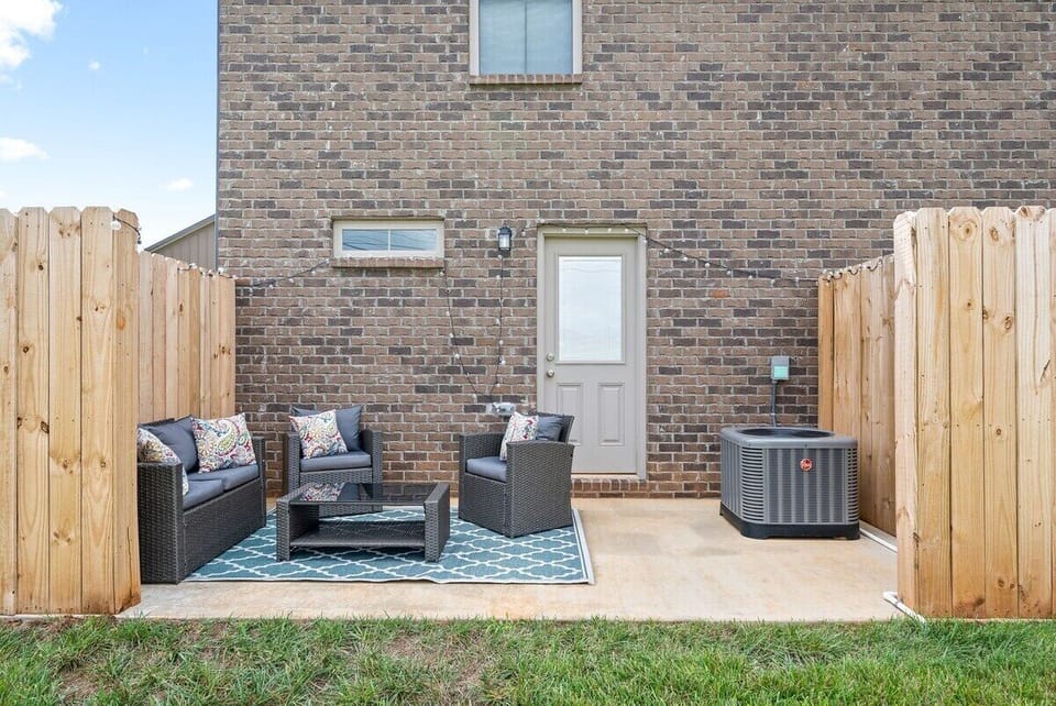 Outdoor Patio Area with Market Lighting, Ideal for a Relaxing Evening and a Glass of Wine