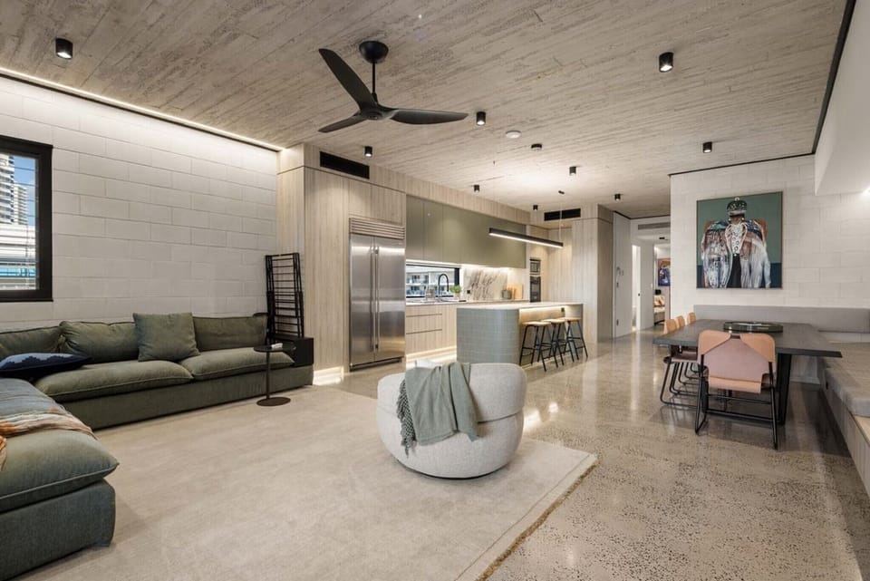 One open level holds the lounge, the kitchen and the dining table