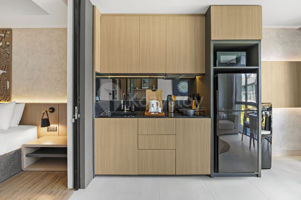 Apartment, 1 Bedroom, Pool View | Private kitchen | Coffee/tea maker, full-size fridge, microwave, stovetop