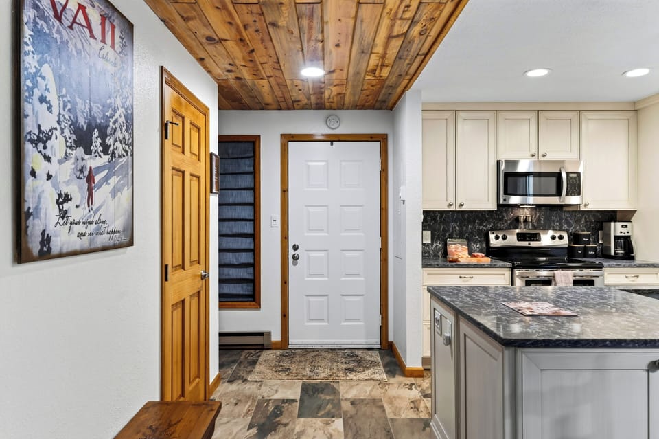 Step inside to a practical entryway that opens directly into the well-equipped kitchen.