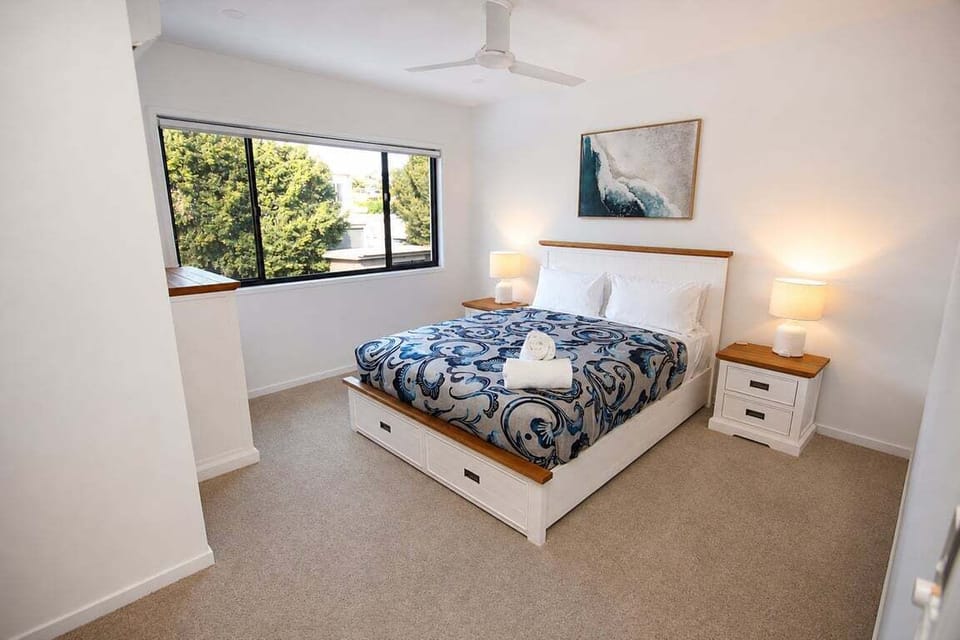 Master Bedroom – spacious upper-level retreat with ensuite, WIR, A/C & ceiling fan for year-round comfort.