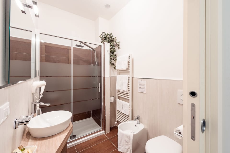 Double or Twin Room | Bathroom | Shower, free toiletries, hair dryer, bidet