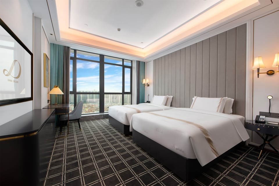 Luxury Twin Room, City View | Desk, laptop workspace, blackout drapes, soundproofing