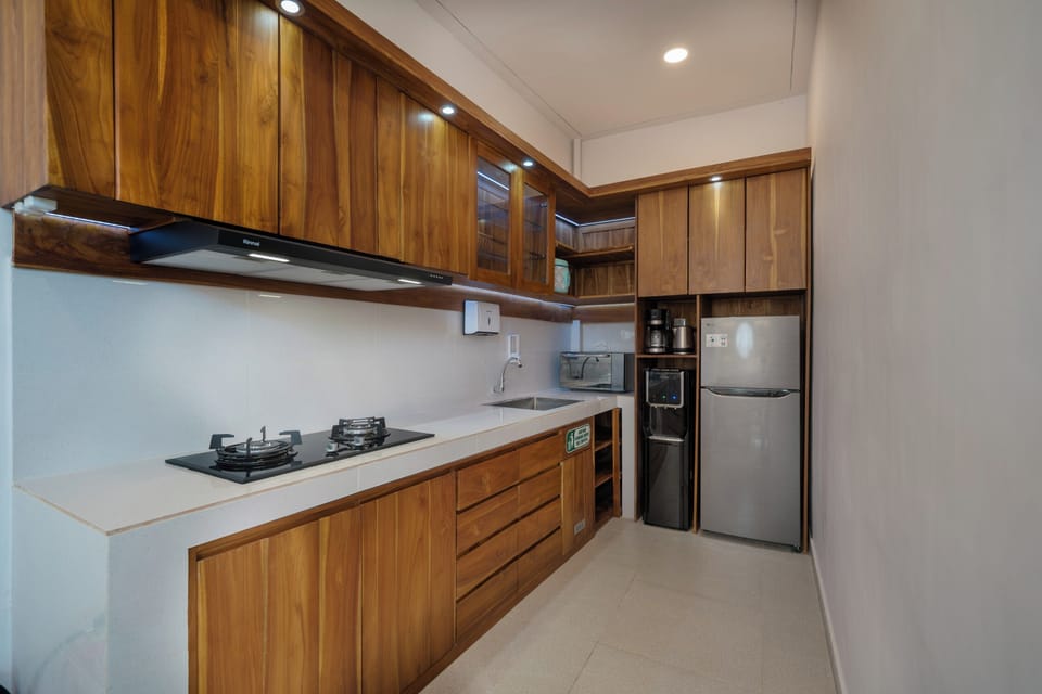 Villa | Private kitchen | Freezer, dining table