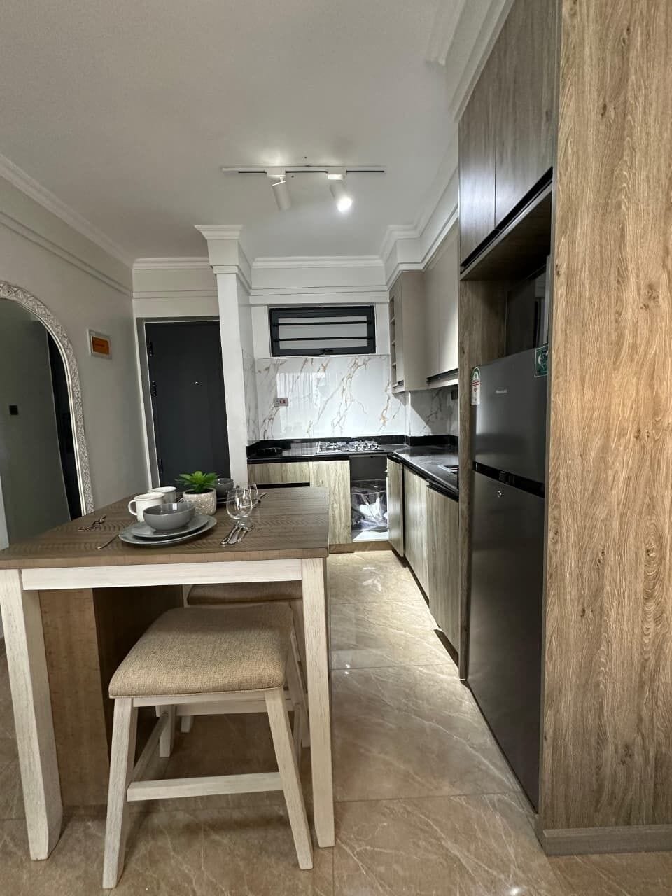Deluxe Apartment, Balcony, City View | Private kitchen | Fridge, microwave, cookware/dishes/utensils