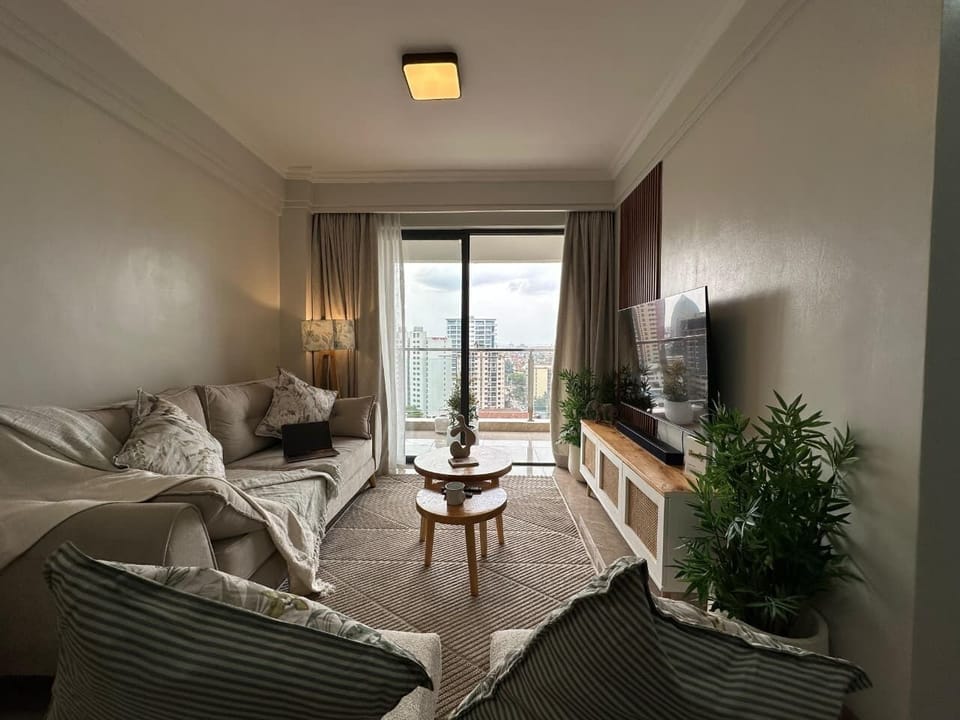 Deluxe Apartment, Balcony, City View | Living area | 32-inch Smart TV with digital channels