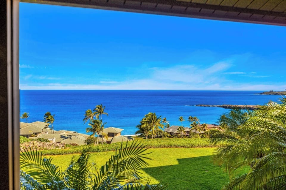 Take in palm-lined coastline views and blue water stretching toward the horizon from your balcony. KRV-2421