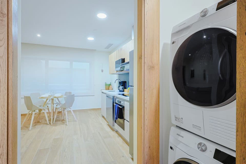 Your in-unit washer and dryer make packing light a breeze, while bright, open spaces and modern finishes await just beyond.