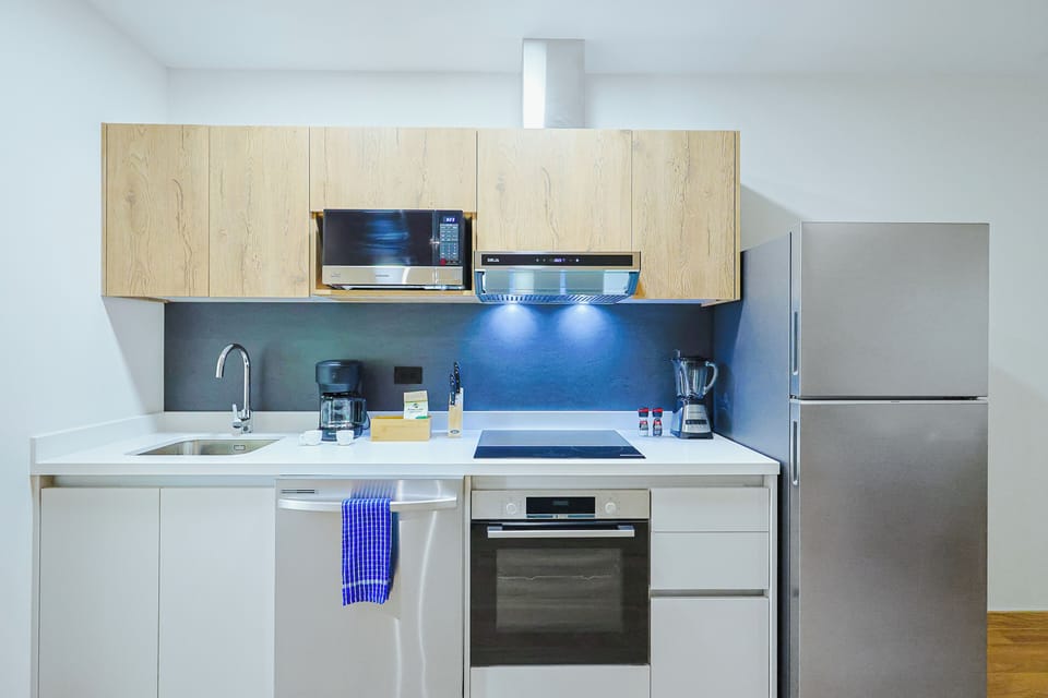Your fully equipped kitchen has everything you need to whip up a meal. Sleek appliances, ample counter space, and modern finishes make cooking feel easy and enjoyable.