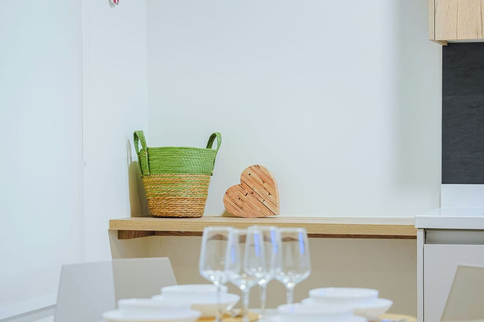 Minimalist accents and natural textures create a calm, welcoming atmosphere.