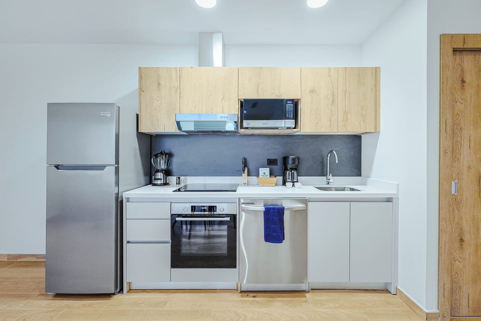 Your fully equipped kitchen has everything you need: fridge, dishwasher, oven, microwave, and coffee maker—ready for easy meal prep and relaxed mornings.