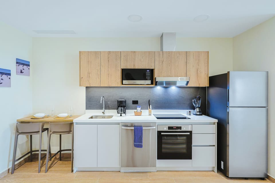 Your fully equipped modern kitchen makes vacation meal prep a breeze, with everything you need from dishwasher to coffee maker ready for your stay.